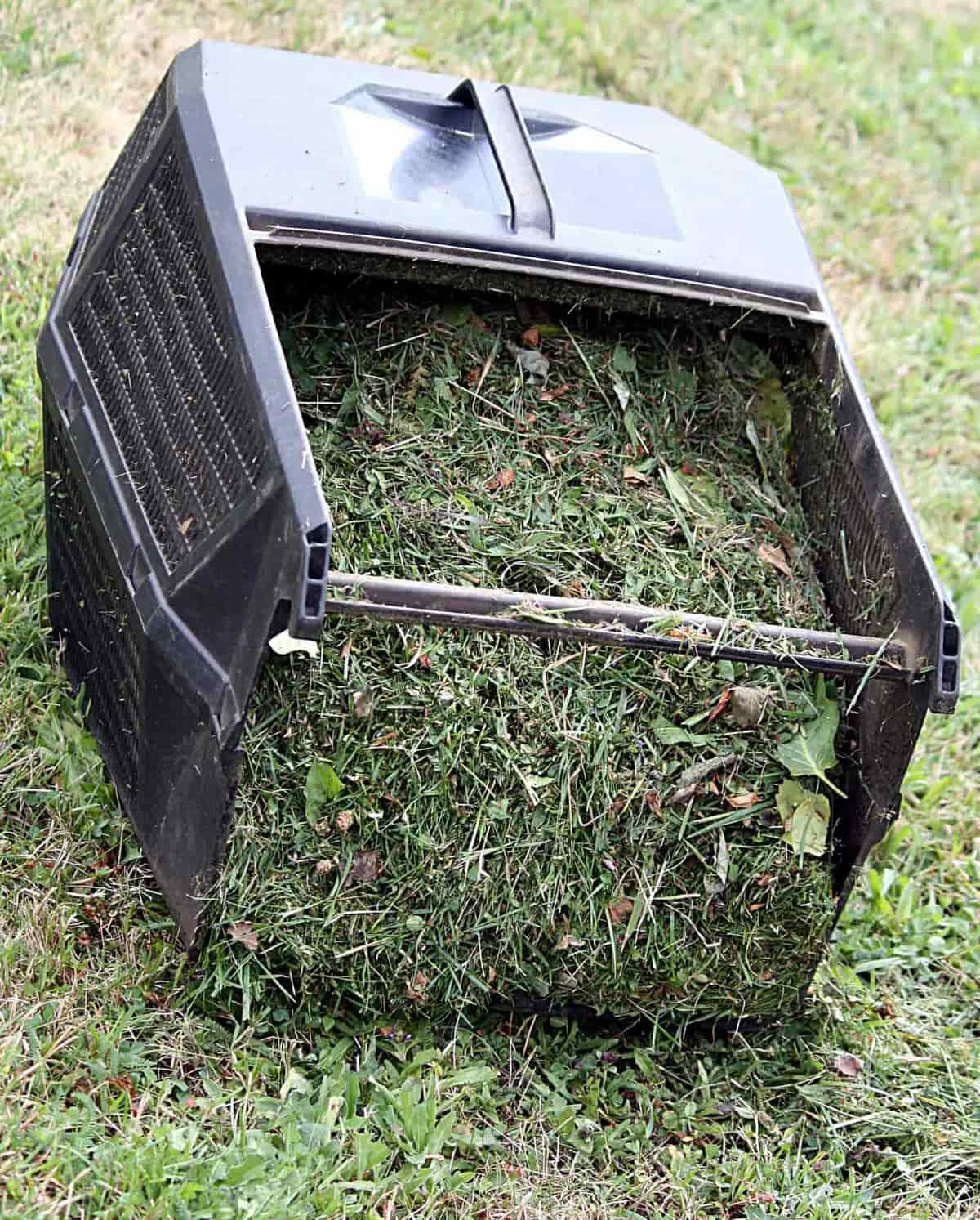 Electric mower parked on a cut lawn